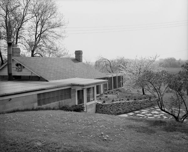 Exterior view from the yard of the house of Professor Ruth B. Glassow at 1635 Norman Way. The house had been a barn on the estate of John R. Commons, a world-renowned University of Wisconsin economist.