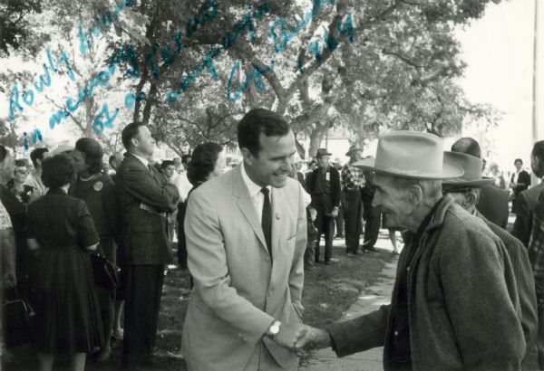 Oil company executive George H.W. Bush was chairman of the Harris County Republican Party in 1964 when he made an unsuccessful run for the U.S. Senate. He gave this photograph of the campaign to journalist Rowland Evans, who covered the campaign, and inscribed the photograph "in memory of a Texas campaign.