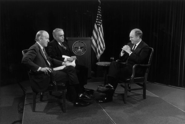 Journalists Rowland Evans and Robert Novak interviewing Dick Cheney while he was secretary of defense.