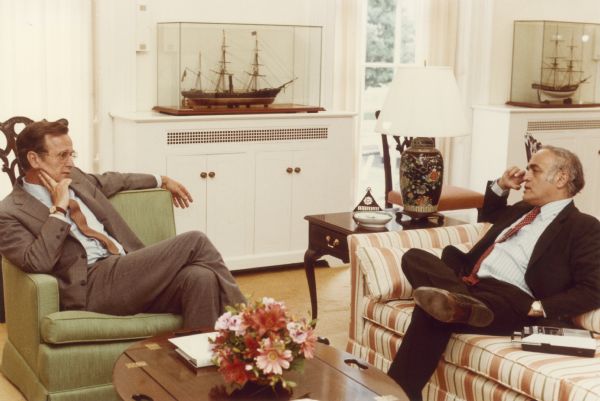 Journalist Robert Novak, a tape recorder to his right, interviews George Herbert Walker Bush.  Bush inscribed the portrait, "pleasant memories."