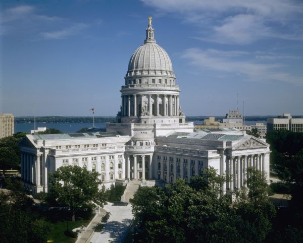 Elevated view of the Wisconsin State Capitol with Lake Monona in the background.