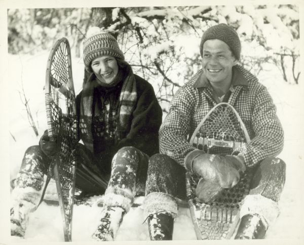 Sigurd F. Olson (April 4, 1899 - January 13, 1982) was an American author, environmentalist, and advocate for the protection of wilderness. Sigurd and Elizabeth Olson are sitting outdoors in the snow holding snowshoes.