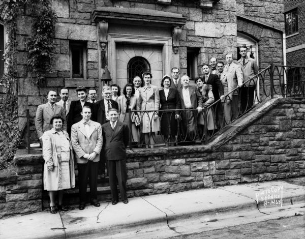 AFSCME American Federation of State, County and Municipal Employees, Summer Vacation Institute class, standing on the steps in front of Delta Tau Delta Fraternity House, 16 West Mendota Court. 
 
