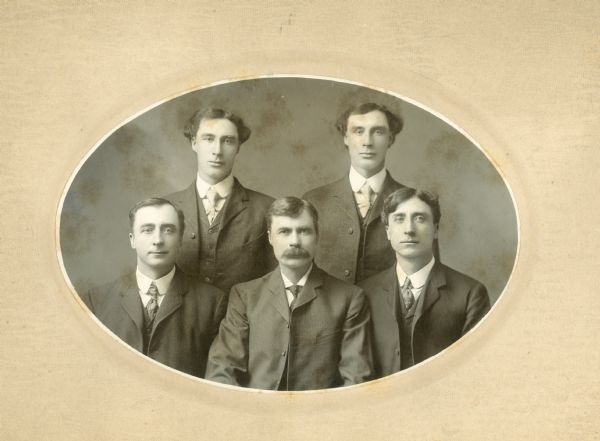 Group studio portrait of men from the Eken family.