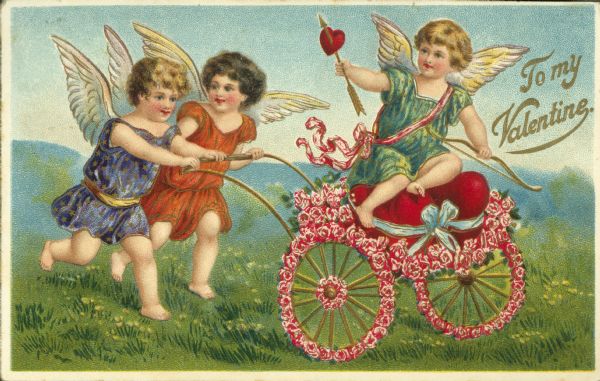 Valentine's Day postcard with Cupid holding a bow and arrow seated in a two-wheeled cart made of flowers, two cherubs are pushing it. They are in a meadow with hills in the background. Text on the right reads: "To My Valentine." Chromolithograph, embossed, printed in Germany.