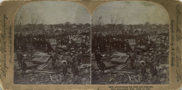 Stereograph of rescuers and onlookers standing among the wreckage in the wake of a cyclone. Bare trees, horses, houses, and a church steeple are in the background.