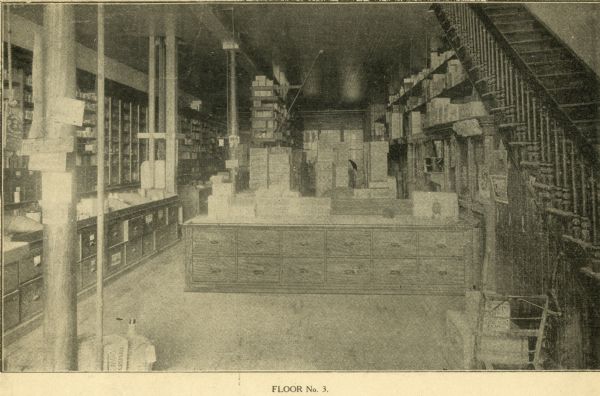 Interior of (Floor No. 3) The F. Dohmen Company Wholesale Druggists.  A salesman's catalog with removable screwed bindings and pages of note paper bound between catalog pages. (One of 13 halftones of the company's exterior and interior images included in catalog.)