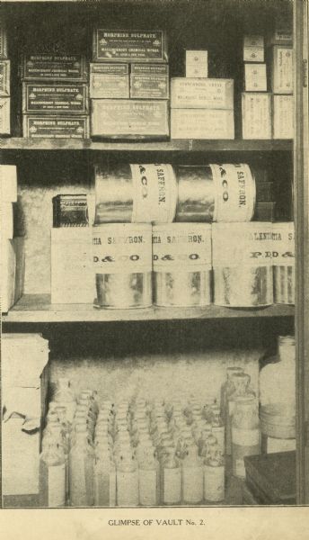 Interior of (Vault No. 2) The F. Dohmen Company Wholesale Druggists. A salesman's catalog with removable screwed bindings and pages of note paper bound between catalog pages. (One of 13 halftones of the company's exterior and interior images included in catalog.)