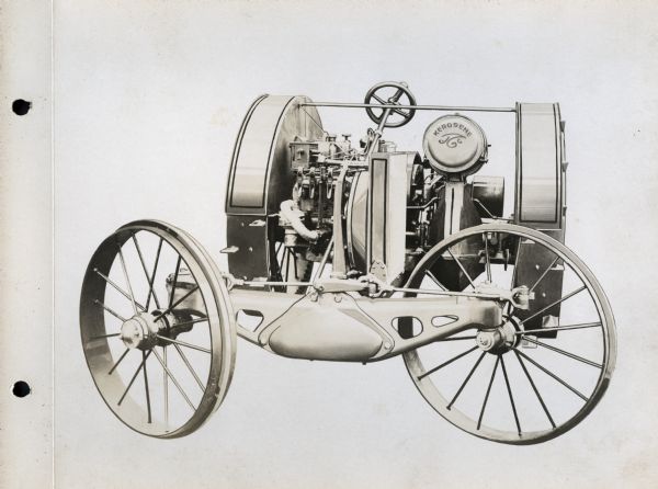 Front view of La Crosse Kerosene Tractor. The front wheels are turned at a sharp angle.