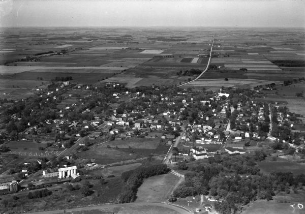 Aerial view of Sun Prairie, including the central business district, residences, and the surrounding countryside stretching to the horizon.