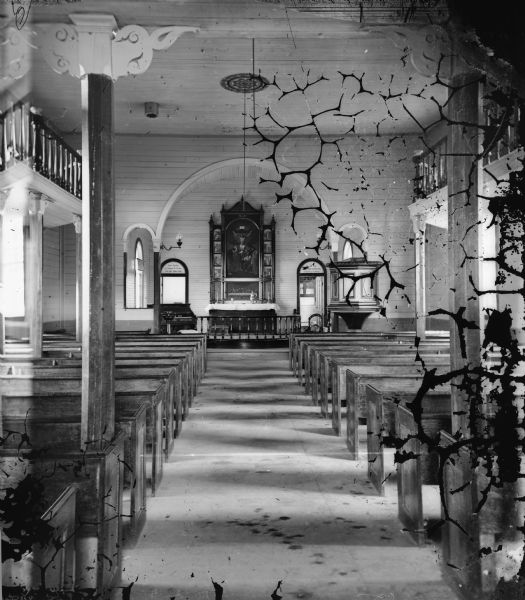 View of the interior of the Immanuel Norwegian Evangelical Lutheran Church, under the care of the Reverend E.J. Homme. The photograph was taken during the Eastern District Norwegian Synod which ran from May 31-June 6, 1877.