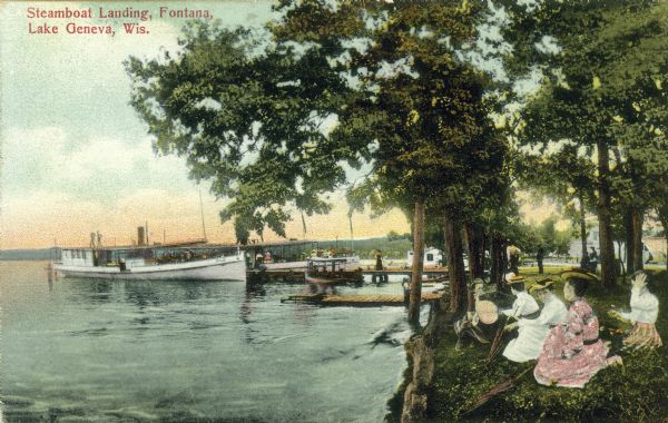 View from shoreline of a steamboat landing on Lake Geneva. A group of women are gathered on the shore in the foreground. Caption reads: "Steamboat Landing, Fontana, Lake Geneva, Wis."