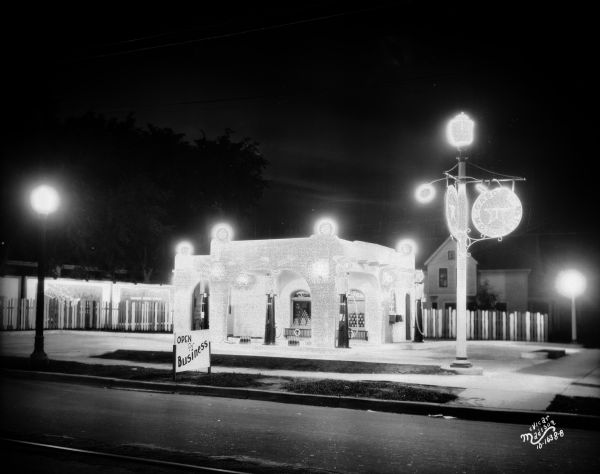New Texaco Service Station at night, at 2846 Atwood Avenue. Owner Joseph M. Setzer.