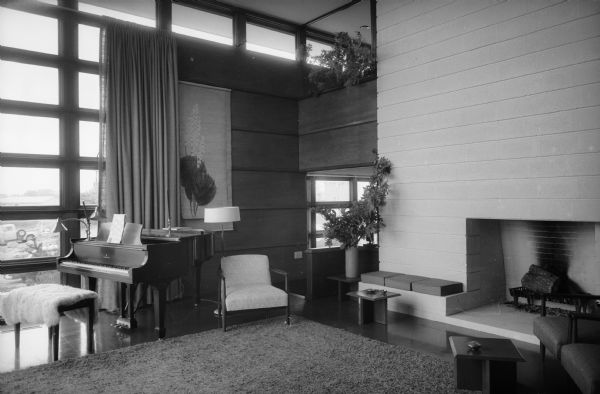 Interior view of the prefabricated home designed by Frank Lloyd Wright and constructed by Marshall Erdman. This example of the Erdman #2 known as the Walter & Mary Ellen Rudin House, 110 Marinette Trail, was built in 1959 and photographed for publicity for the Madison Parade of Homes.