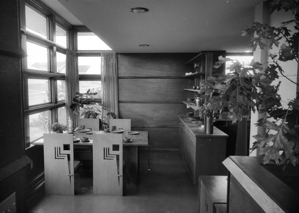 Dining area of the Walter & Mary Rudin House, 110 Marinette Trail, an example of Erdman #2, a Frank Lloyd Wright-design prefabricated house marketed and constructed by Marshall Erdman in 1959. This photograph was taken for the Madison Parade of Homes.
