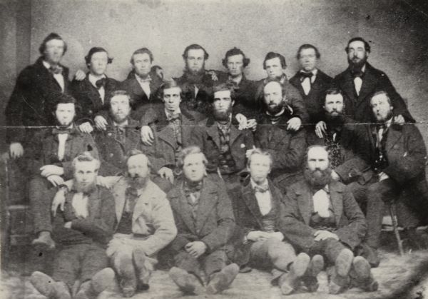 Group portrait of men employed at Milwaukee & Watertown Railway.