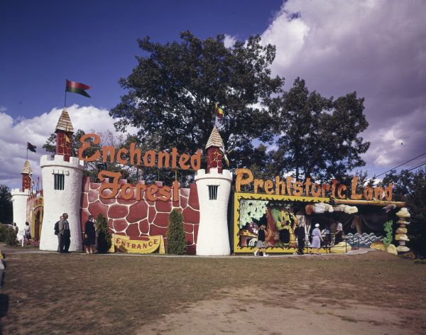 People entering the Enchanted Forest and Prehistoric Land.