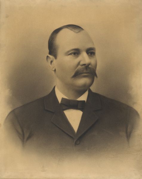 Head and shoulders portrait of Frank Weber wearing a bow tie.
