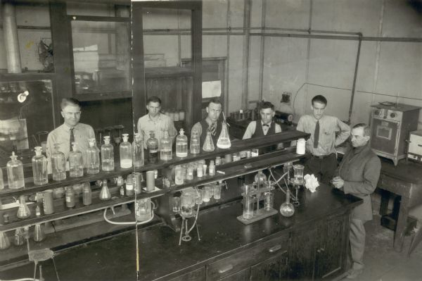 Elevated view of men in the Corner Section of Analytical at Ray-O-Vac Corporation.


