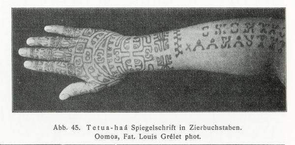 A hand and arm tattooed with designs originating on the Marquesas Islands.