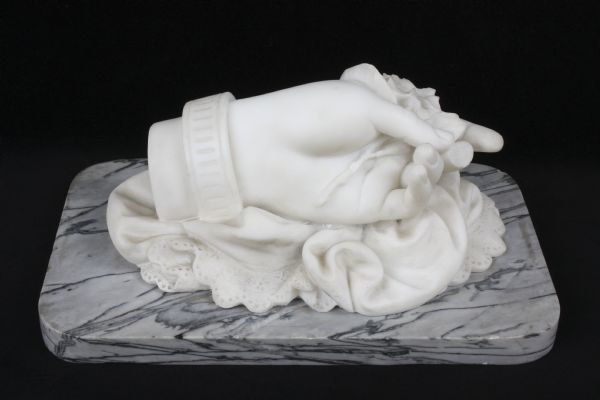 Photograph of sculpture of a hand entitled "Idleness," created by Vinnie Ream Hoxie.
