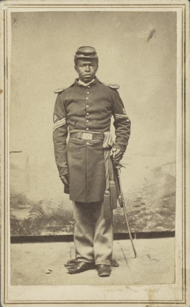Full-length portrait of Sargeant Major Meekins. Co. "K" 36th U.S. Colored Troops.