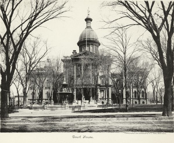 Exterior view of the old Court House with park in front of it.