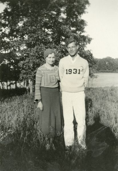 Outdoor portrait of Henry Lawrence Ahlgren (1908-2004) and Harriet Gleason (1911-1998) while students at the University of Wisconsin. The couple married February 1, 1936 and live in Madison, Wisconsin.