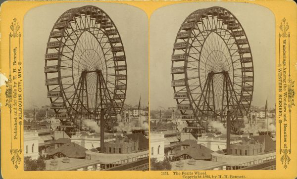 Stereograph over rooftops of the Ferris wheel at the Chicago World's Fair.