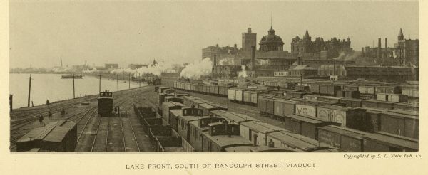 Elevated view of rows of railroad cars at the lakefront in Chicago, south of the Randolph Street viaduct.