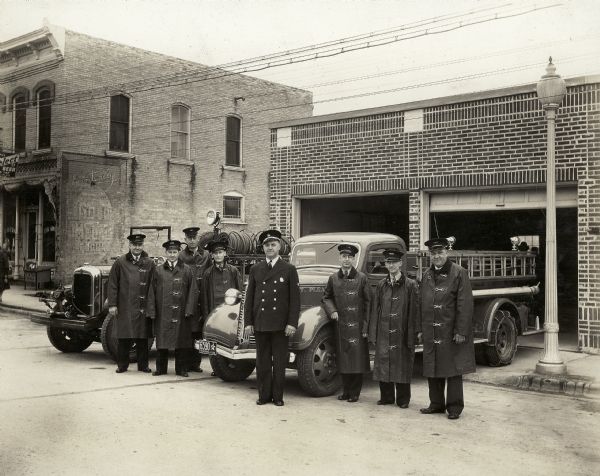 The Monticello Fire Company, with Christ M. Stauffer, the chief, standing at the center.