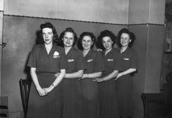 A team portrait of the Lauftenberg Brothers Company women's bowling team at the Lutheran Center.