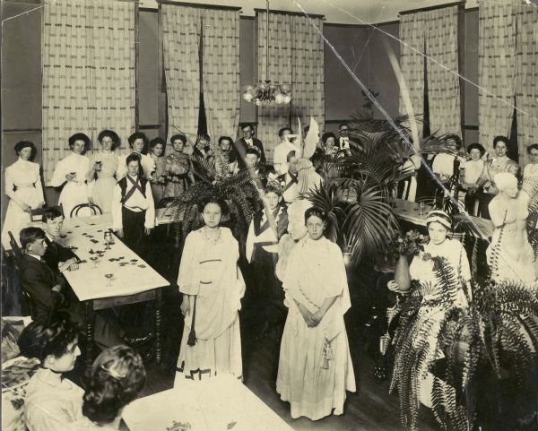 Badger Beauty contest at the University of Wisconsin-Madison. Helen Fitzgerald is shown in back against the wall 6th from the left. She was a member of Tri Delta Sorority.