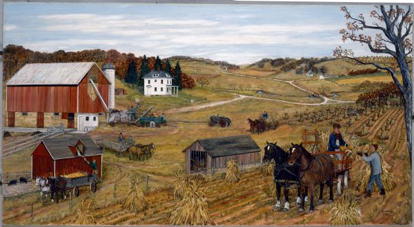 Two farm workers in the righthand foreground toss a corn bundle up to the horse-drawn corn shredding machine to be shredded. To the left, a man loads feed corn into the corn crib and behind that, light fodder is blown into the upstairs of the barn. The farmhouse is visible in the background.