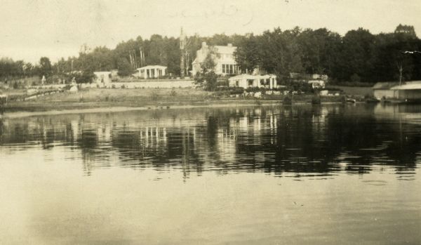View of Kraftwood, the Kraft family summer home, seen from Enterprise Lake. (Formerly Lake Mach-Kin-O-Siew.)