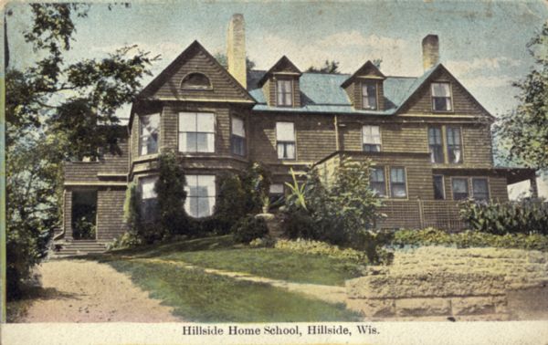 The first building built for the Hillside Home School, 4 Miles from Spring Green. Exterior view of the Hillside Home Building, a Shingle Style building, designed by Frank Lloyd Wright in 1887 for his aunts, Jane and Ellen Lloyd Jones. It was used as a dormitory and library. Wright had the building demolished in 1950. Caption reads: "Hillside Home Building, Hillside, Wis."