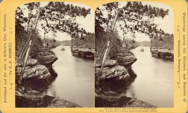 View from opposite Sexton's Eddy up the Wisconsin River. A steamboat is in the distance, and there are rock formations along the river. Text at right: "Wanderings Among the Wonders and Beauties of Wisconsin Scenery."