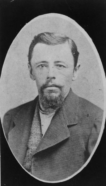 Oval quarter-length portrait of Paul A. Seifert. Born June 11, 1846 and died August 18, 1921. A folk artist, Paul Seifert painted a number of Wisconsin farms in and around Richland County, circa 1885.