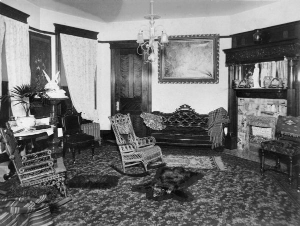Interior of the lavishly decorated sitting room in Halle Steensland's house at 315 North Carroll Street.