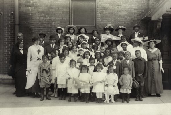 Group portrait of a Loyal Temperance League organization largely comprised of African American women and children.