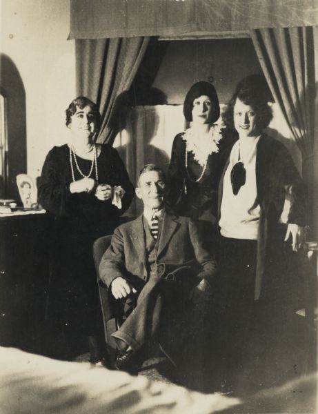 From left to right are Angeline Sidell, August (Uncle Sid) Sidell (seated), Violet (Billie) Sidell and Pierre Sidell.