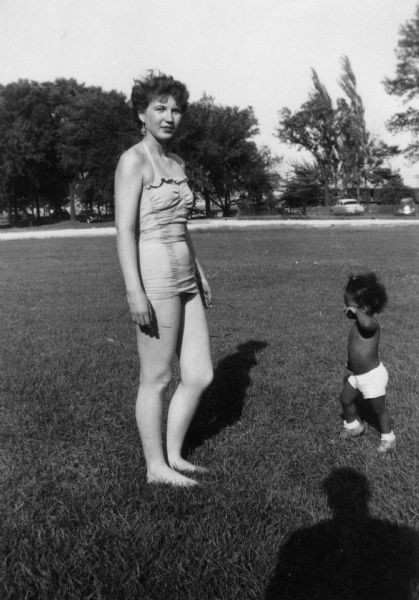 View of a woman in a bathing suit and a toddler at Brittingham Park.