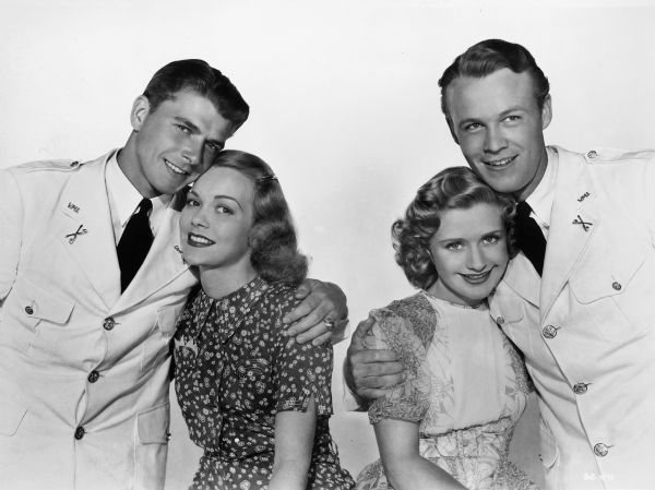 Ronald Reagan, Jane Wyman, Priscilla Lane, and Wayne Morris in a publicity still for Warner Brothers' film "Brother Rat."