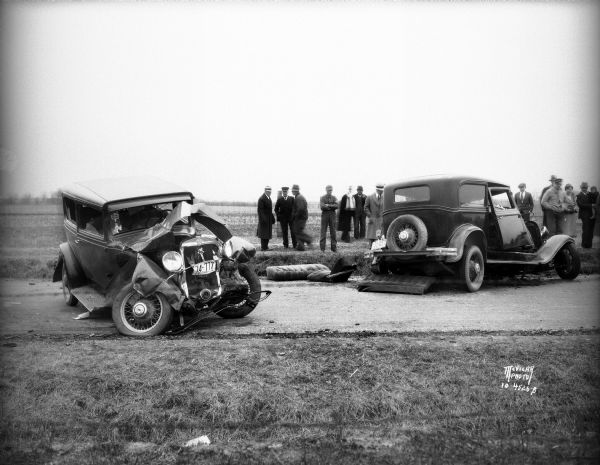 Damaged automobiles of Leo Maly and August Steinhagen at scene of accident at Middleton Junction Road. Leo Maly was killed, his wife, Edna, and son, Paul, and brother-in-law, Raymond Frisch, were injured. August Sternhagen, from Mazomanie, was injured.