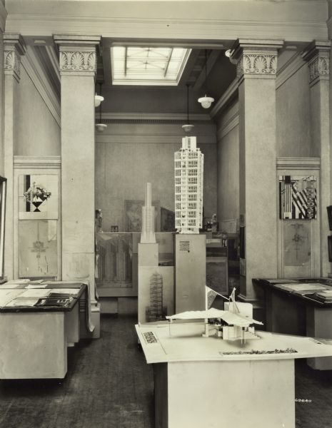 Exhibit of the works of Frank Lloyd Wright at the Layton Art Gallery in Milwaukee which toured the United States between 1930 and 1931 and which aided in the revival of Wright's career. Numerous models and drawings of Wright-designed buildings are on display. Portions of the gallery can be seen in the background.