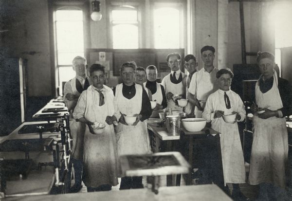 These young men and boys are students in a baking class at a vocational school.