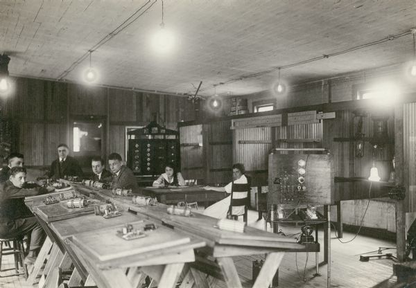 Students at their desks in a telegraphy class.