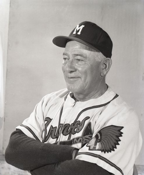 Waist-up studio portrait of Milwaukee Braves Assistant Manager, Charlie Root, in uniform.