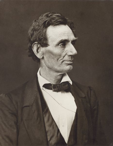 Quarter-length profile portrait of Abraham Lincoln.