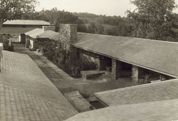 Taliesin I loggia, studio, apartment, and hayloft as seen from where the porte-cochere meets the roof of the residence.